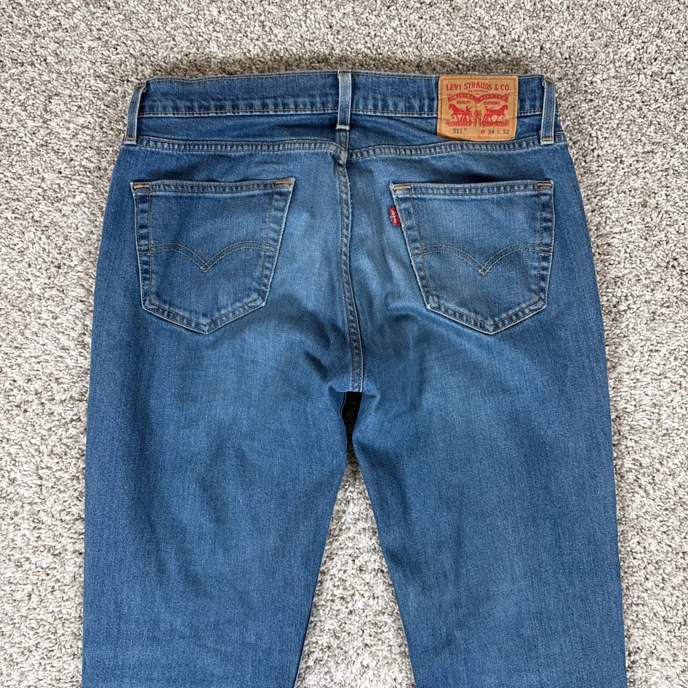Levi's 511 Jeans Mens 34x32 Blue Medium Wash Distressed Denim Slim Fit - Picture 13 of 15